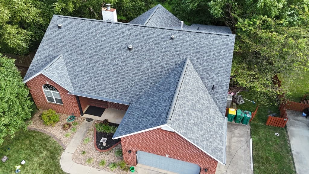 Otis Pressley project — clean finished architectural shingle roof from an elevated documentation angle